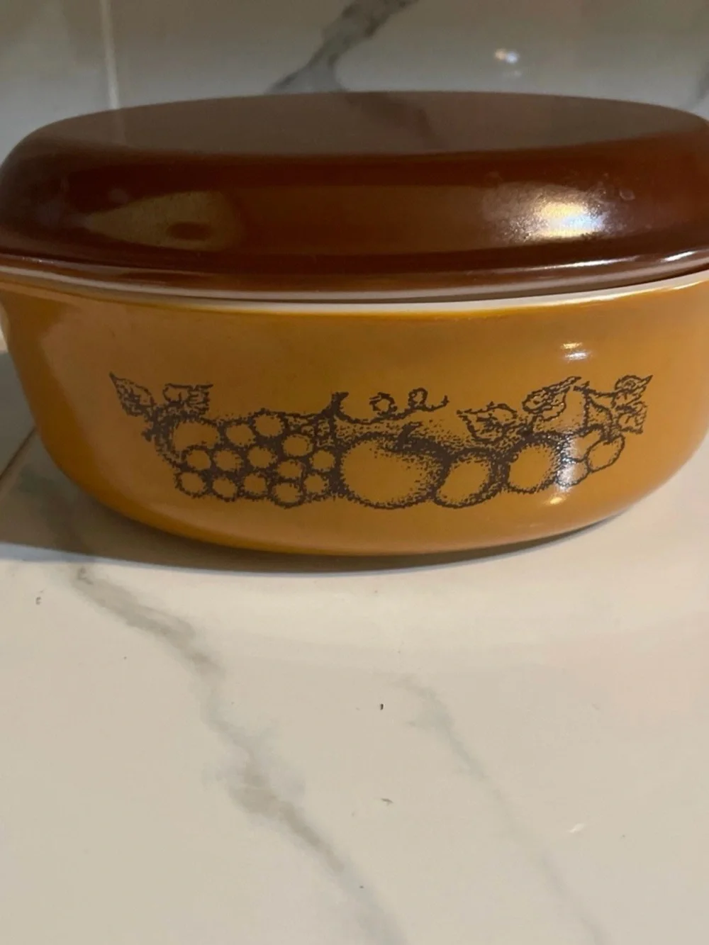 Pyrex Amber and Brown Covered Casserole with Fruit Motif